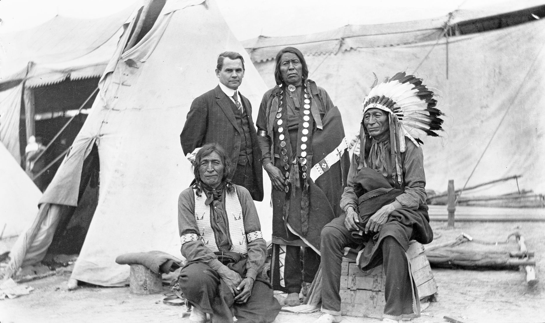 Joe Scheurele with unidentified men